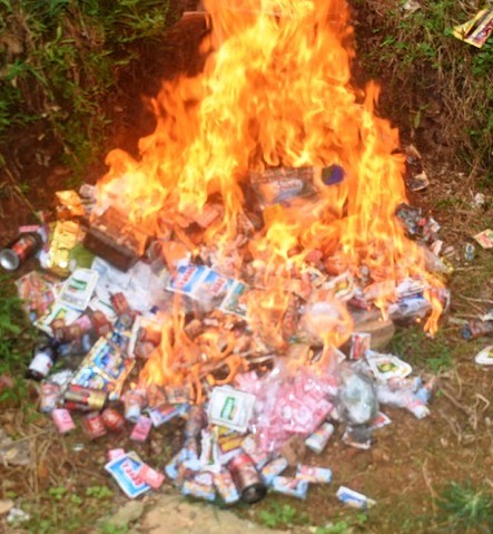 The seized tobacco products destroyed in Wokha on September 11. (DIPR Photo)